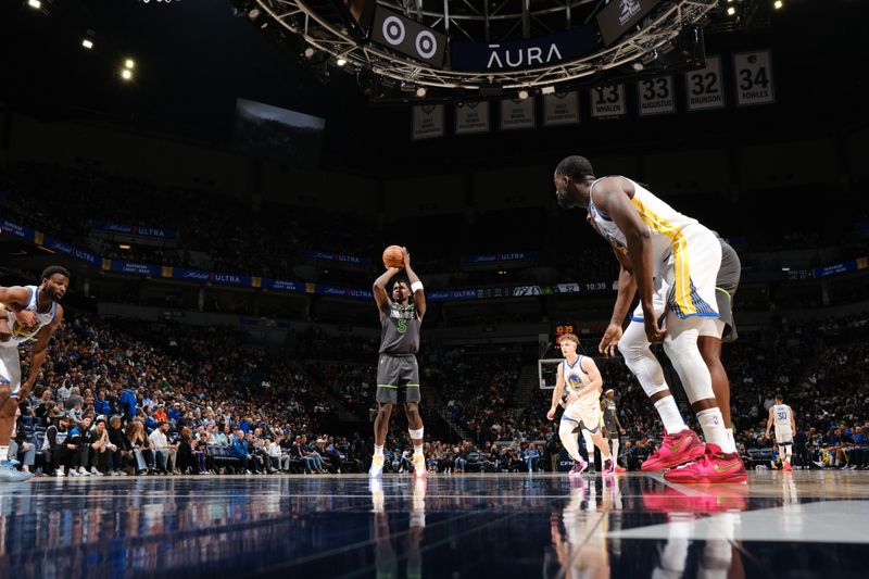 MINNEAPOLIS, MN -  MARCH 24: Anthony Edwards #5 of the Minnesota Timberwolves shoots a free throw during the game against the Golden State Warriors on March 24, 2024 at Target Center in Minneapolis, Minnesota. NOTE TO USER: User expressly acknowledges and agrees that, by downloading and or using this Photograph, user is consenting to the terms and conditions of the Getty Images License Agreement. Mandatory Copyright Notice: Copyright 2024 NBAE (Photo by David Sherman/NBAE via Getty Images)