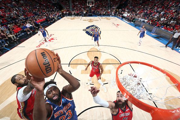 NEW ORLEANS, LA - OCTOBER 28: Mitchell Robinson #23 of the New York Knicks dunks the ball during the game against the New Orleans Pelicans on October 28, 2023 at the Smoothie King Center in New Orleans, Louisiana. NOTE TO USER: User expressly acknowledges and agrees that, by downloading and or using this Photograph, user is consenting to the terms and conditions of the Getty Images License Agreement. Mandatory Copyright Notice: Copyright 2023 NBAE (Photo by Layne Murdoch Jr./NBAE via Getty Images)