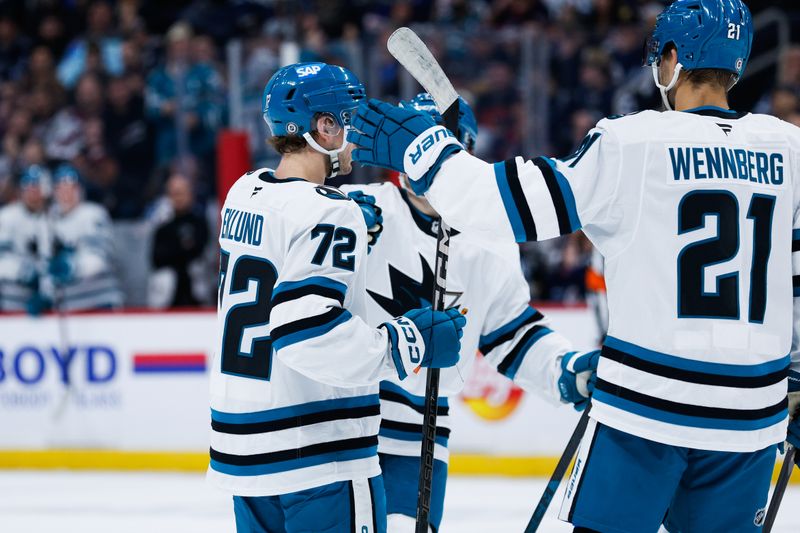 Feb 24, 2025; Winnipeg, Manitoba, CAN;  San Jose Sharks forward William Eklund (72) celebrates with teammates after his goal against the Winnipeg Jets during the first period at Canada Life Centre. Mandatory Credit: Terrence Lee-Imagn Images