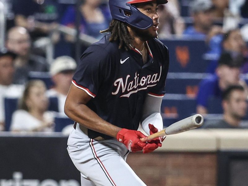 Jul 9, 2024; New York City, New York, USA;  Washington Nationals left fielder James Wood (29) hits a single in the eighth inning against the New York Mets at Citi Field. Mandatory Credit: Wendell Cruz-USA TODAY Sports