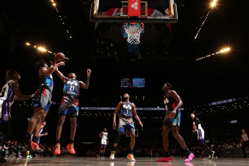 BROOKLYN, NY - APRIL 7: Noah Clowney #21 of the Brooklyn Nets  grabs a rebound during the game against the Sacramento Kings on April 7, 2024 at Barclays Center in Brooklyn, New York. NOTE TO USER: User expressly acknowledges and agrees that, by downloading and or using this Photograph, user is consenting to the terms and conditions of the Getty Images License Agreement. Mandatory Copyright Notice: Copyright 2024 NBAE (Photo by Nathaniel S. Butler/NBAE via Getty Images)