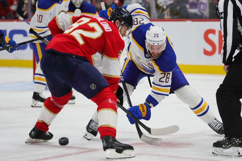 Feb 27, 2024; Sunrise, Florida, USA; Buffalo Sabres left wing Zemgus Girgensons (28) and Florida Panthers center Kevin Stenlund (82) face-off during the second period at Amerant Bank Arena. Mandatory Credit: Sam Navarro-USA TODAY Sports