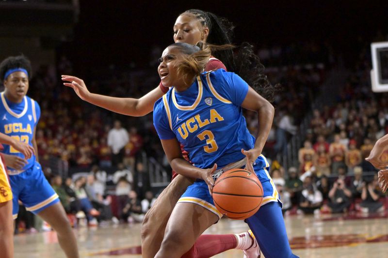 Jan 14, 2024; Los Angeles, California, USA; USC Trojans guard Taylor Bigby (1) pressures UCLA Bruins guard Londynn Jones (3) as she looses control of the ball in the first half at Galen Center. Mandatory Credit: Jayne Kamin-Oncea-USA TODAY Sports