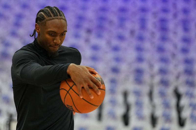 PHILADELPHIA, PENNSYLVANIA - OCTOBER 23: Tyrese Maxey #0 of the Philadelphia 76ers warms up prior to the game against the Milwaukee Bucks at the Wells Fargo Center on October 23, 2024 in Philadelphia, Pennsylvania. NOTE TO USER: User expressly acknowledges and agrees that, by downloading and/or using this photograph, user is consenting to the terms and conditions of the Getty Images License Agreement. (Photo by Mitchell Leff/Getty Images)