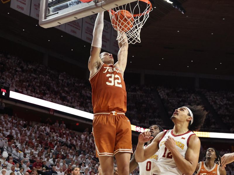 Jan 17, 2023; Ames, Iowa, USA; Texas Longhorns forward Christian Bishop (32) scores a basket against the Iowa State Cyclones during the second half at James H. Hilton Coliseum. Mandatory Credit: Reese Strickland-USA TODAY Sports