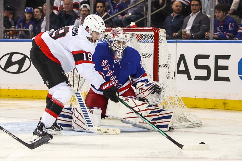 Apr 15, 2024; New York, New York, USA;  New York Rangers goaltender Igor Shesterkin (31) defends the net from a shot on goal attempt by Ottawa Senators right wing Drake Batherson (19) in the second period at Madison Square Garden. Mandatory Credit: Wendell Cruz-USA TODAY Sports