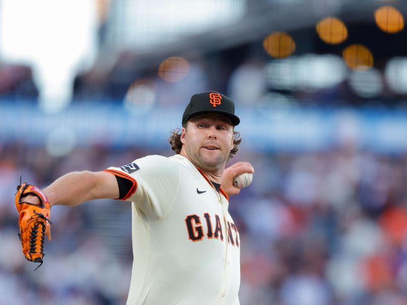 Jun 24, 2024; San Francisco, California, USA; San Francisco Giants pitcher Erik Miller throws a pitch during the first inning against the Chicago Cubs at Oracle Park. All Giants players wore the number 24 in honor of Giants former player Willie Mays. Mandatory Credit: Sergio Estrada-USA TODAY Sports