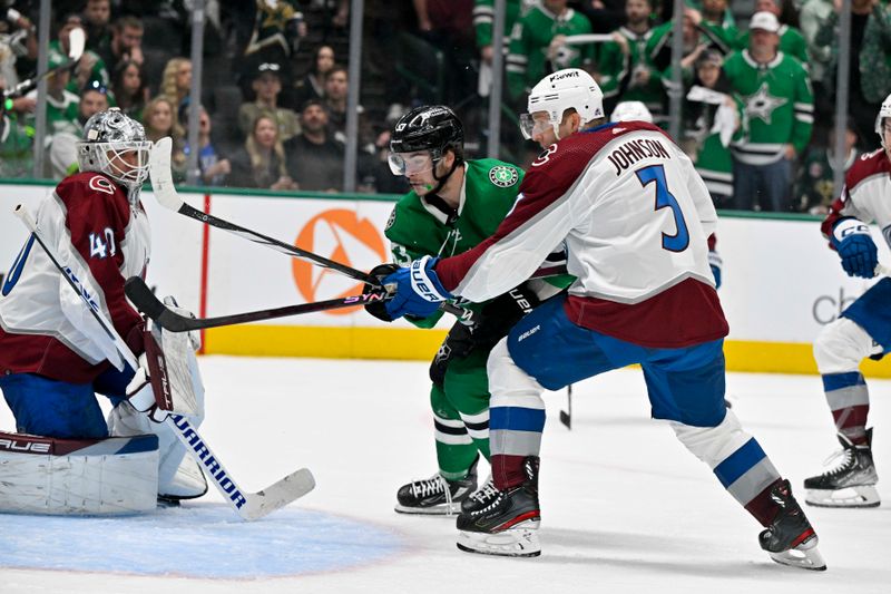 May 7, 2024; Dallas, Texas, USA; Dallas Stars center Wyatt Johnston (53) attempts to redirect the puck past Colorado Avalanche goaltender Alexandar Georgiev (40) as defenseman Jack Johnson (3) looks on during the overtime period in game one of the second round of the 2024 Stanley Cup Playoffs at American Airlines Center. Mandatory Credit: Jerome Miron-USA TODAY Sports