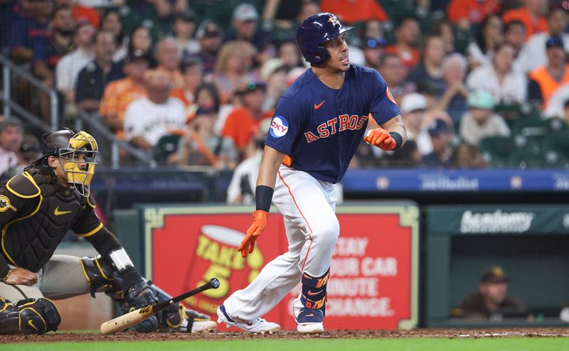 Sep 10, 2023; Houston, Texas, USA; Houston Astros designated hitter Michael Brantley (23) hits a single during the sixth inning against the San Diego Padres at Minute Maid Park. Mandatory Credit: Troy Taormina-USA TODAY Sports