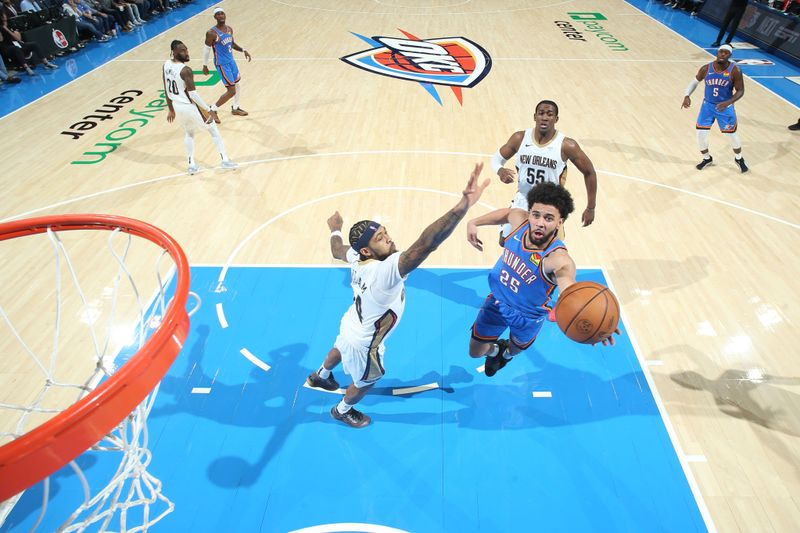 OKLAHOMA CITY, OK - NOVEMBER 13: Ajay Mitchell #25 of the Oklahoma City Thunder drives to the basket during the game against the New Orleans Pelicans on November 13, 2024 at Paycom Center in Oklahoma City, Oklahoma. NOTE TO USER: User expressly acknowledges and agrees that, by downloading and or using this photograph, User is consenting to the terms and conditions of the Getty Images License Agreement. Mandatory Copyright Notice: Copyright 2024 NBAE (Photo by Nathaniel S. Butler/NBAE via Getty Images)