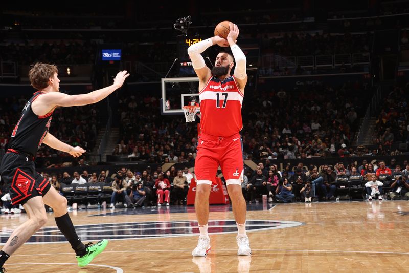 WASHINGTON, DC -? JANUARY 1:  Jonas Valanciunas #17 of the Washington Wizards shoots the ball during the game against the Chicago Bulls on January 1, 2025 at Capital One Arena in Washington, DC. NOTE TO USER: User expressly acknowledges and agrees that, by downloading and or using this Photograph, user is consenting to the terms and conditions of the Getty Images License Agreement. Mandatory Copyright Notice: Copyright 2025 NBAE (Photo by Kenny Giarla/NBAE via Getty Images)