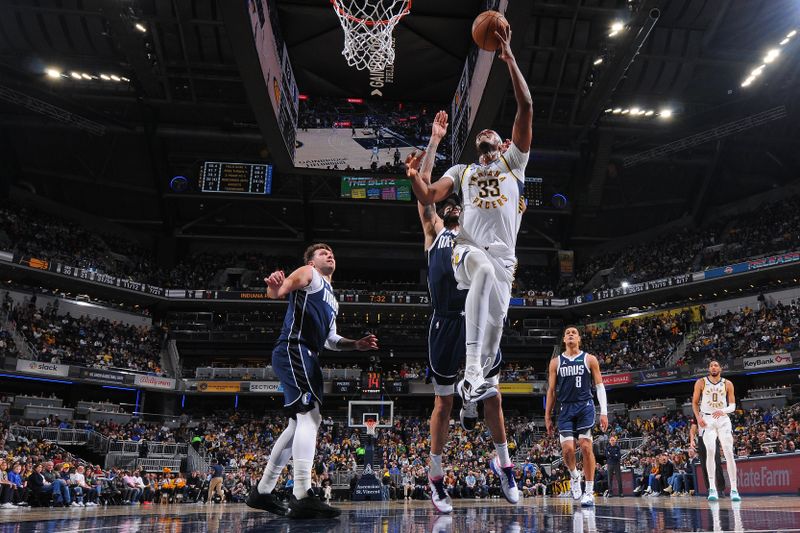 INDIANAPOLIS, IN - FEBRUARY 25:  Myles Turner #33 of the Indiana Pacers shoots the ball during the game against the Dallas Mavericks on February 25, 2024 at Gainbridge Fieldhouse in Indianapolis, Indiana. NOTE TO USER: User expressly acknowledges and agrees that, by downloading and or using this Photograph, user is consenting to the terms and conditions of the Getty Images License Agreement. Mandatory Copyright Notice: Copyright 2024 NBAE (Photo by Ron Hoskins/NBAE via Getty Images)