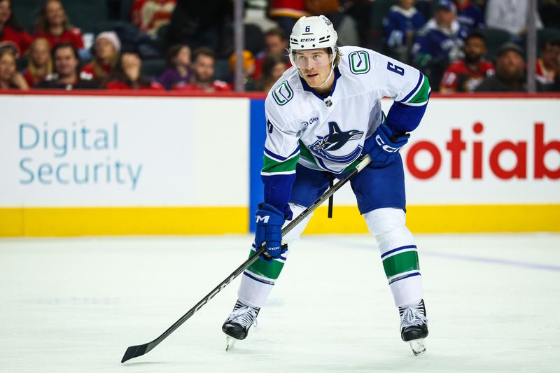 Dec 31, 2024; Calgary, Alberta, CAN; Vancouver Canucks right wing Brock Boeser (6) against the Calgary Flames during the third period at Scotiabank Saddledome. Mandatory Credit: Sergei Belski-Imagn Images