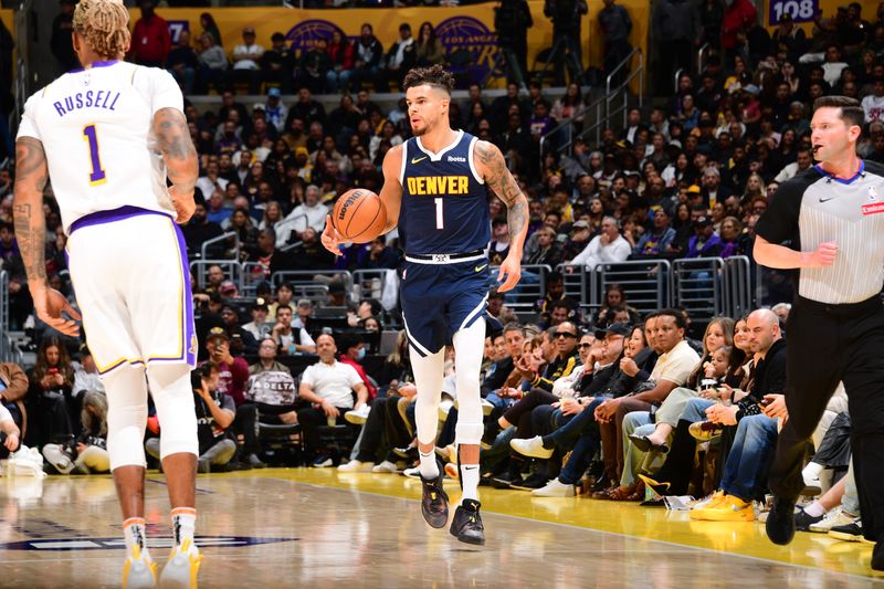 LOS ANGELES, CA - NOVEMBER 23: Michael Porter Jr. #1 of the Denver Nuggets dribbles the ball during the game against the Los Angeles Lakers on November 23, 2024 at Crypto.Com Arena in Los Angeles, California. NOTE TO USER: User expressly acknowledges and agrees that, by downloading and/or using this Photograph, user is consenting to the terms and conditions of the Getty Images License Agreement. Mandatory Copyright Notice: Copyright 2024 NBAE (Photo by Adam Pantozzi/NBAE via Getty Images)