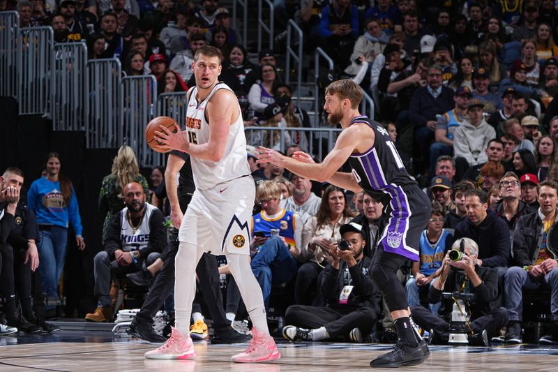 DENVER, CO - FEBRUARY 28: Nikola Jokic #15 of the Denver Nuggets handles the ball during the game against the Sacramento Kings on February 28, 2024 at the Ball Arena in Denver, Colorado. NOTE TO USER: User expressly acknowledges and agrees that, by downloading and/or using this Photograph, user is consenting to the terms and conditions of the Getty Images License Agreement. Mandatory Copyright Notice: Copyright 2024 NBAE (Photo by Garrett Ellwood/NBAE via Getty Images)