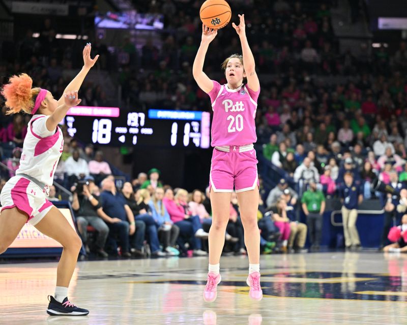 Feb 4, 2024; South Bend, Indiana, USA; Pittsburgh Panthers guard Aislin Malcolm (20) shoots as Notre Dame Fighting Irish guard Hannah Hidalgo (3) defends in the first half at the Purcell Pavilion. Mandatory Credit: Matt Cashore-USA TODAY Sports