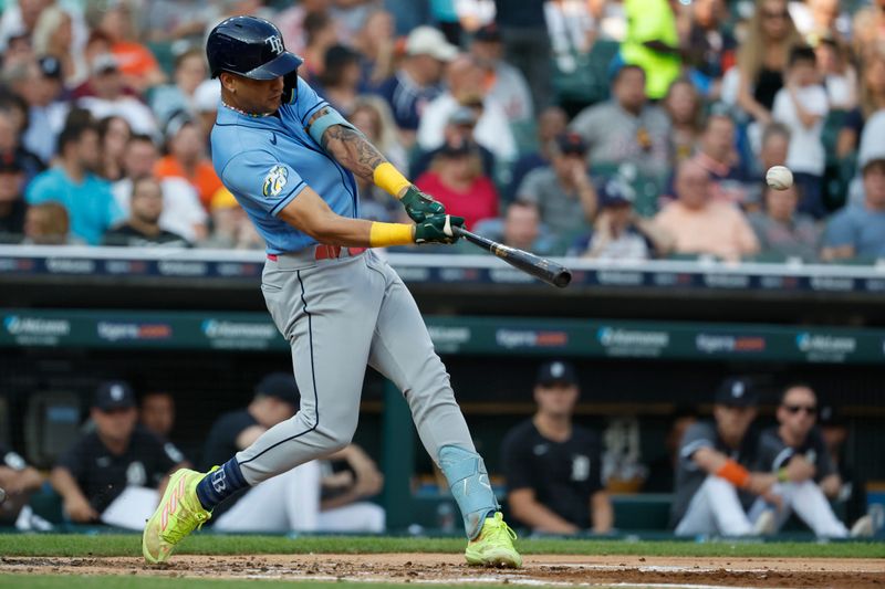 Aug 4, 2023; Detroit, Michigan, USA;  Tampa Bay Rays center fielder Jose Siri (22) hits a two run home run in the second inning against the Detroit Tigers at Comerica Park. Mandatory Credit: Rick Osentoski-USA TODAY Sports