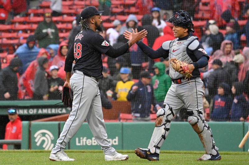 Apr 18, 2024; Boston, Massachusetts, USA; Cleveland Guardians pitcher Emmanuel Clase (48) reacts against the Boston Red Sox  with catcher Bo Naylor (23) at Fenway Park. Mandatory Credit: Eric Canha-USA TODAY Sports