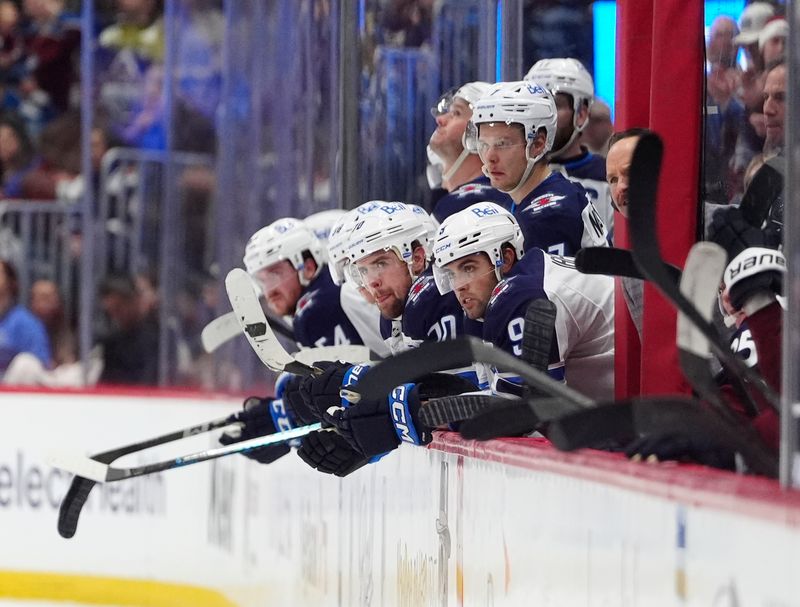 Dec 19, 2025; Denver, Colorado, USA; Members of the Winnipeg Jets during the third period against the Colorado Avalanche at Ball Arena. Mandatory Credit: Ron Chenoy-Imagn Images