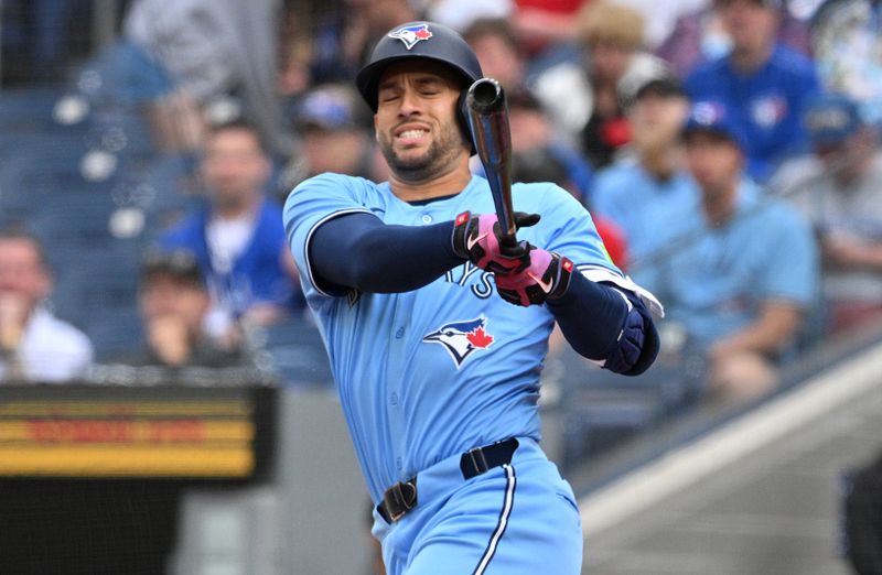 May 12, 2024; Toronto, Ontario, CAN;  Toronto Blue Jays right fielder George Springer (4) hits a foul ball against the Minnesota in the first inning at Rogers Centre. Mandatory Credit: Dan Hamilton-USA TODAY Sports