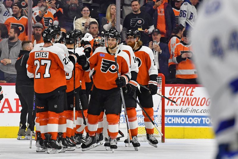 Feb 27, 2024; Philadelphia, Pennsylvania, USA; Philadelphia Flyers right wing Tyson Foerster (71) celebrates win teammates against the Tampa Bay Lightning  at Wells Fargo Center. Mandatory Credit: Eric Hartline-USA TODAY Sports