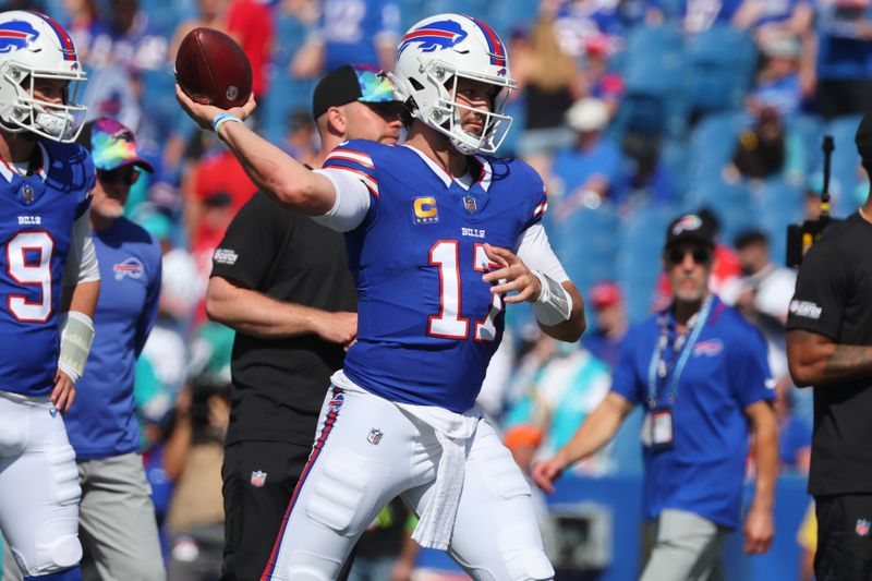 Buffalo Bills quarterback Josh Allen (17) warms up prior to an NFL football game against the Miami Dolphins, Sunday, Oct. 1, 2023, in Orchard Park, N.Y. (AP Photo/Jeffrey T. Barnes)