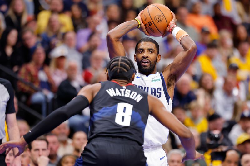 DENVER, COLORADO - NOVEMBER 3: Kyrie Irving #11 of the Dallas Mavericks looks to pass the ball against the Denver Nuggets in the third quarter during the NBA In-Season Tournament at Ball Arena on November 3, 2023 in Denver, Colorado. NOTE TO USER: User expressly acknowledges and agrees that, by downloading and or using this photograph, User is consenting to the terms and conditions of the Getty Images License Agreement. (Photo by C. Morgan Engel/Getty Images)