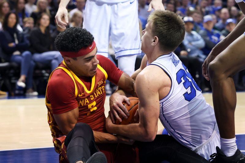 Jan 16, 2024; Provo, Utah, USA; Iowa State Cyclones guard Tamin Lipsey (3) and Brigham Young Cougars guard Dallin Hall (30) tie up a ball during the second half at Marriott Center. Mandatory Credit: Rob Gray-USA TODAY Sports