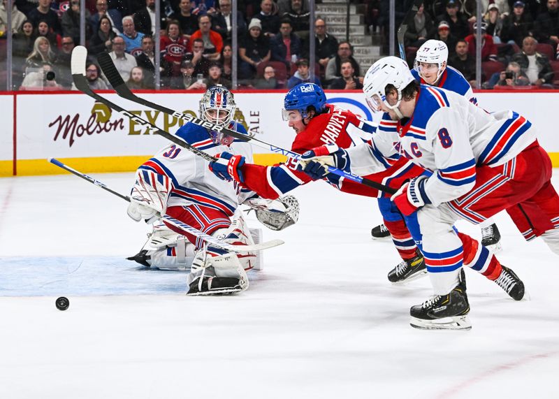 Mar 9, 2023; Montreal, Quebec, CAN; New York Rangers goalie Igor Shesterkin (31) makes a save against Montreal Canadiens left wing Rafael Harvey-Pinard (49) during overtime at Bell Centre. Mandatory Credit: David Kirouac-USA TODAY Sports