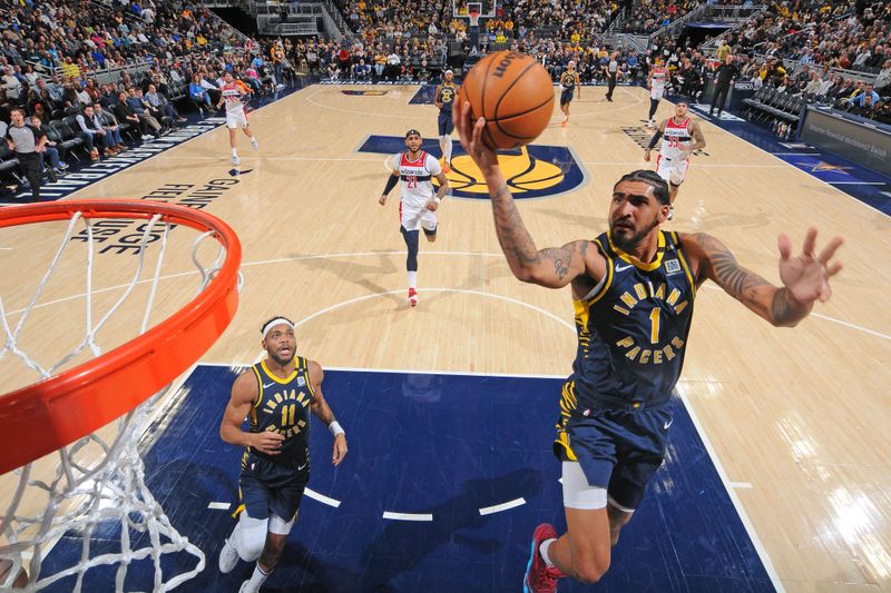 INDIANAPOLIS, IN - JANUARY 10: Obi Toppin #1 of the Indiana Pacers drives to the basket during the game against the Washington Wizards on January 10, 2024 at Gainbridge Fieldhouse in Indianapolis, Indiana. NOTE TO USER: User expressly acknowledges and agrees that, by downloading and or using this Photograph, user is consenting to the terms and conditions of the Getty Images License Agreement. Mandatory Copyright Notice: Copyright 2024 NBAE (Photo by Ron Hoskins/NBAE via Getty Images)