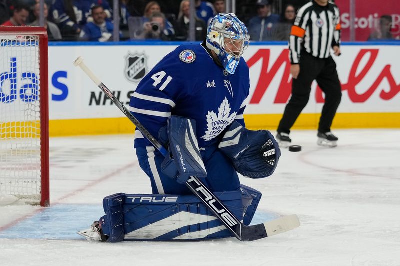 Nov 8, 2024; Toronto, Ontario, CAN; Toronto Maple Leafs goaltender Anthony Stolarz (41) makes a save against the Detroit Red Wings during the second period at Scotiabank Arena. Mandatory Credit: John E. Sokolowski-Imagn Images