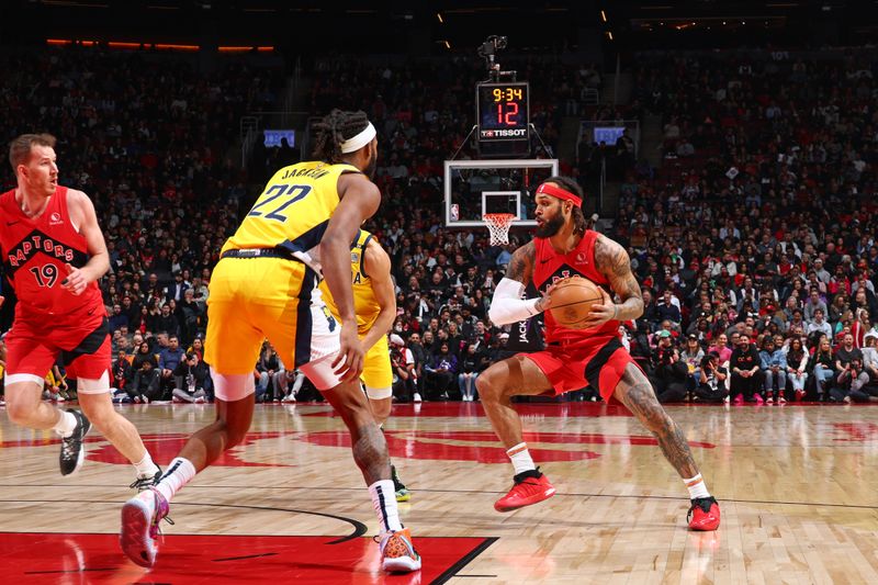 TORONTO, CANADA - FEBRUARY 14: Gary Trent Jr. #33 of the Toronto Raptors handles the ball during the game against the Indiana Pacers on February 14, 2024 at the Scotiabank Arena in Toronto, Ontario, Canada.  NOTE TO USER: User expressly acknowledges and agrees that, by downloading and or using this Photograph, user is consenting to the terms and conditions of the Getty Images License Agreement.  Mandatory Copyright Notice: Copyright 2024 NBAE (Photo by Vaughn Ridley/NBAE via Getty Images)