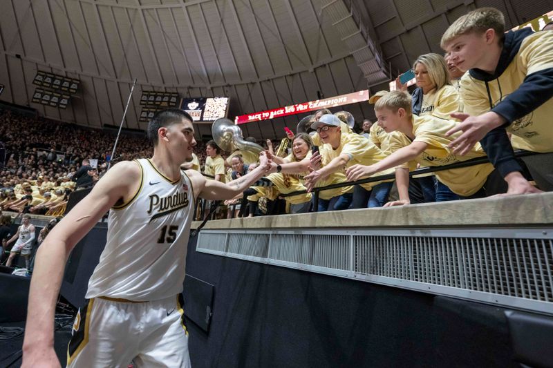 Mar 2, 2024; West Lafayette, Indiana, USA; Purdue Boilermakers center Zach Edey (15) high fives the student section after the game against the Michigan State Spartans at Mackey Arena. Mandatory Credit: Marc Lebryk-USA TODAY Sports