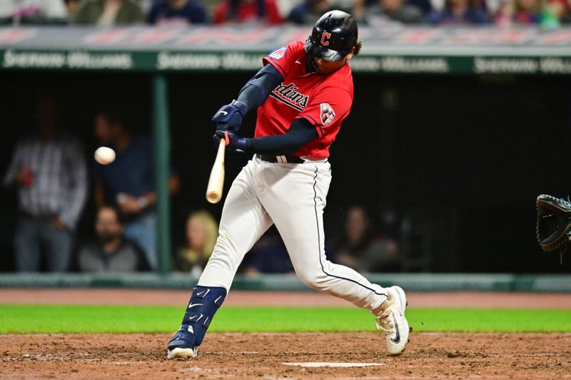 Sep 1, 2023; Cleveland, Ohio, USA; Cleveland Guardians catcher Bo Naylor (23) hits an RBI double during the seventh inning against the Tampa Bay Rays at Progressive Field. Mandatory Credit: Ken Blaze-USA TODAY Sports