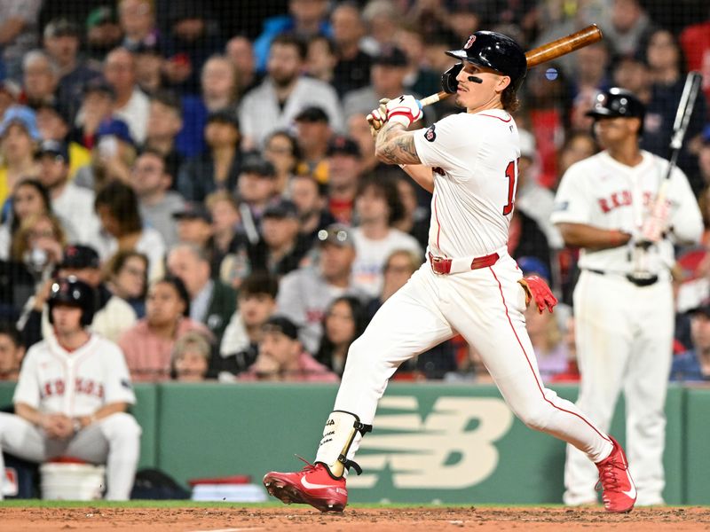 Apr 28, 2024; Boston, Massachusetts, USA; Boston Red Sox left fielder Jarren Duran (16) hits a two-run RBI triple against the Chicago Cubs during the sixth inning at Fenway Park. Mandatory Credit: Brian Fluharty-USA TODAY Sports