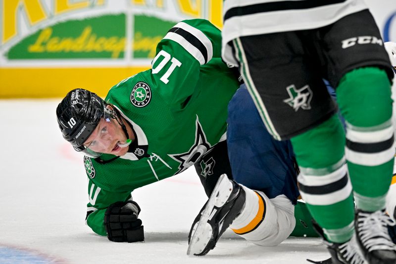 Oct 15, 2022; Dallas, Texas, USA; Dallas Stars center Ty Dellandrea (10) looks for the puck during the first period against the Nashville Predators at the American Airlines Center. Mandatory Credit: Jerome Miron-USA TODAY Sports