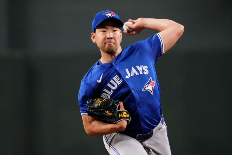 Jul 14, 2024; Phoenix, Arizona, USA; Toronto Blue Jays pitcher Yusei Kikuchi (16) pitches against the Arizona Diamondbacks during the first inning at Chase Field. Mandatory Credit: Joe Camporeale-USA TODAY Sports