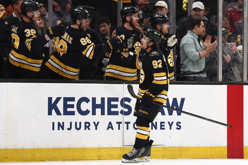 Mar 3, 2026; Boston, Massachusetts, USA; Boston Bruins center Marat Khusnutdinov (92) is congratulated at the bench by right wing David Pastrnak (88) after scoring against the Pittsburgh Penguins during the first period at TD Garden. Mandatory Credit: Winslow Townson-Imagn Images