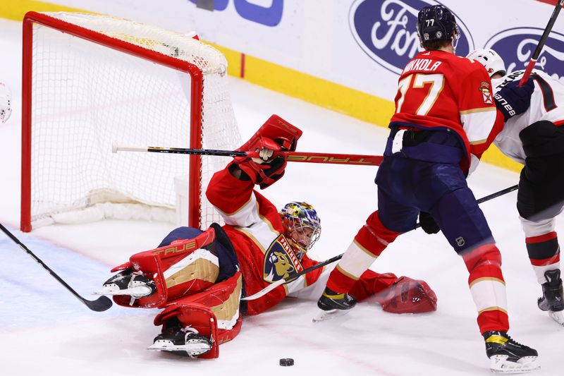 Apr 9, 2024; Sunrise, Florida, USA; Florida Panthers goaltender Anthony Stolarz (41) makes a save after a shot by Ottawa Senators left wing Brady Tkachuk (7) during the third period at Amerant Bank Arena. Mandatory Credit: Sam Navarro-USA TODAY Sports