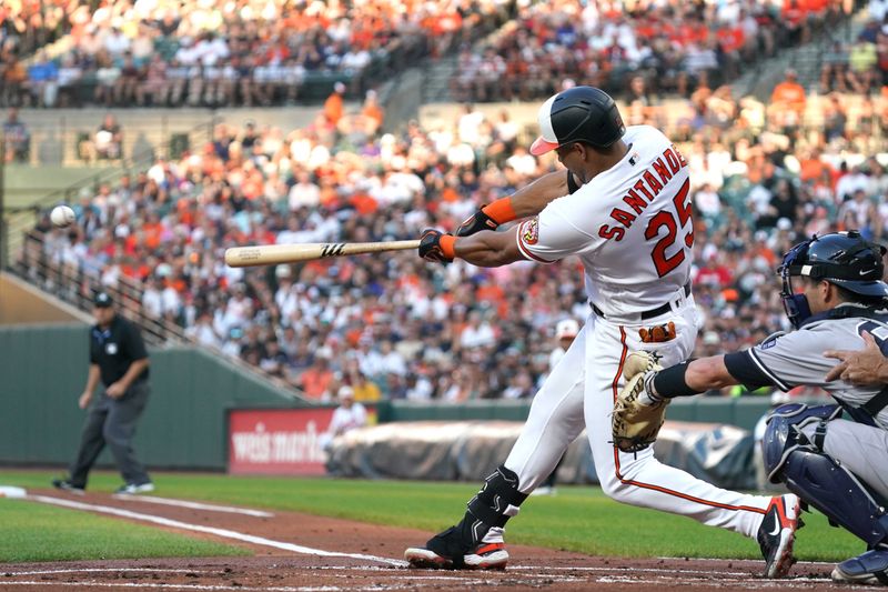 Jul 30, 2023; Baltimore, Maryland, USA; Baltimore Orioles outfielder Anthony Santander (25) connects on a double to drive in two runs in the first inning against the New York Yankees at Oriole Park at Camden Yards. Mandatory Credit: Mitch Stringer-USA TODAY Sports