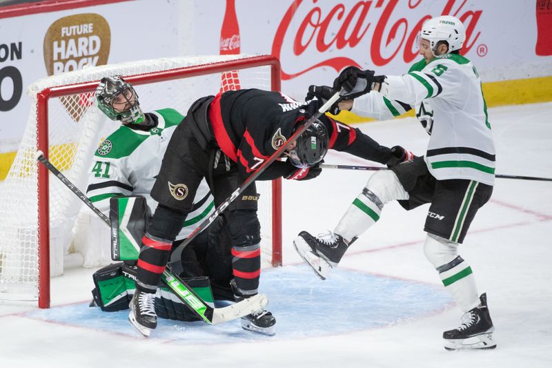 Oct 24, 2022; Ottawa, Ontario, CAN; Ottawa Senators left wing Brady Tkacuk (7) and Dallas Stars defenseman Nils Lundkvist (5) jockey for position in front of goalie Scott Wedgewood (41) in the third period at the Canadian Tire Centre. Mandatory Credit: Marc DesRosiers-USA TODAY Sports