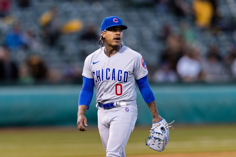 Apr 18, 2023; Oakland, California, USA; Chicago Cubs starting pitcher Marcus Stroman (0) walks off the field after throwing against the Oakland Athletics during the second inning at RingCentral Coliseum. Mandatory Credit: John Hefti-USA TODAY Sports