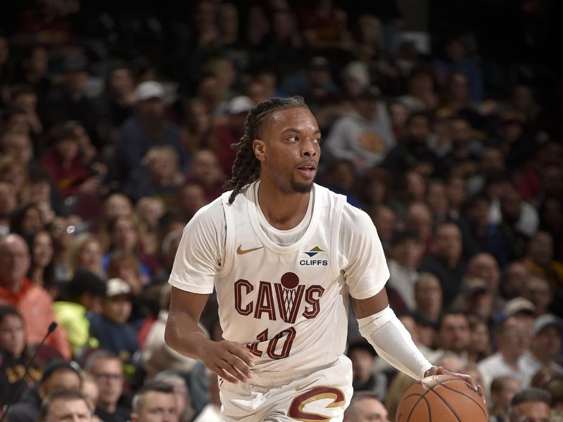 CLEVELAND, OH - NOVEMBER 24: Darius Garland #10 of the Cleveland Cavaliers dribbles the ball during the game against the Toronto Raptors on November 24, 2024 at Rocket Mortgage FieldHouse in Cleveland, Ohio. NOTE TO USER: User expressly acknowledges and agrees that, by downloading and/or using this Photograph, user is consenting to the terms and conditions of the Getty Images License Agreement. Mandatory Copyright Notice: Copyright 2024 NBAE (Photo by David Liam Kyle/NBAE via Getty Images)