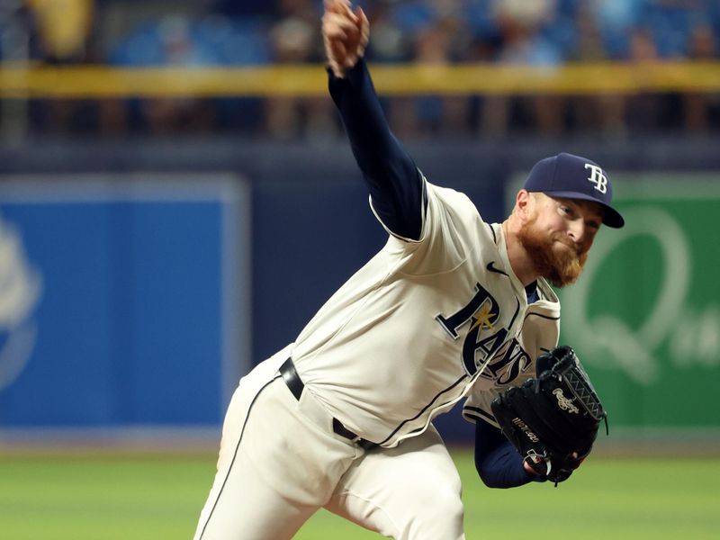 Sep 3, 2024; St. Petersburg, Florida, USA; Tampa Bay Rays pitcher Drew Rasmussen (57) throws a pitch against the Minnesota Twins during the eighth inning at Tropicana Field. Mandatory Credit: Kim Klement Neitzel-Imagn Images