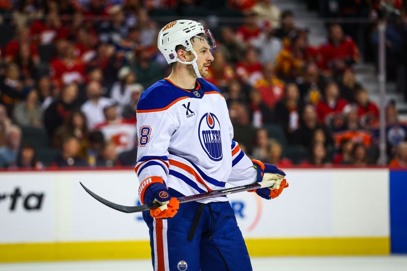 Dec 27, 2025; Calgary, Alberta, CAN; Edmonton Oilers left wing Zach Hyman (18) reacts during the third period against the Calgary Flames at Scotiabank Saddledome. Mandatory Credit: Sergei Belski-Imagn Images