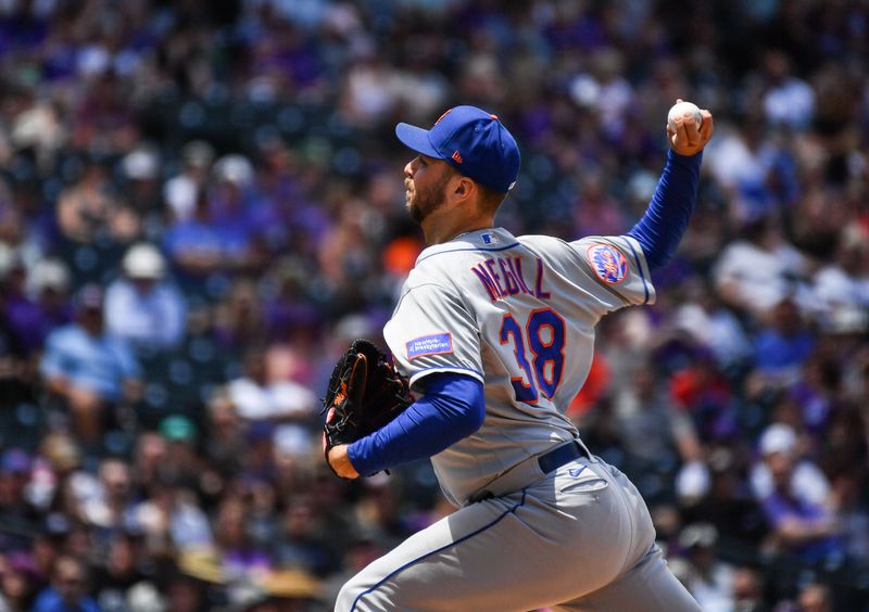 May 28, 2023; Denver, Colorado, USA; New York Mets starting pitcher Tylor Megill (38) delivers a pitch in the first inning against the Colorado Rockies at Coors Field. Mandatory Credit: John Leyba-USA TODAY Sports