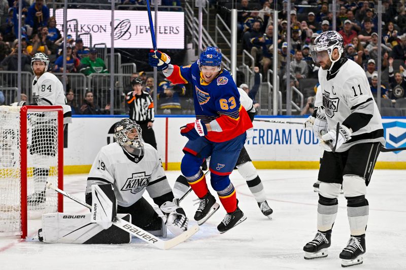 Mar 13, 2024; St. Louis, Missouri, USA;  St. Louis Blues left wing Jake Neighbours (63) reacts after scoring against Los Angeles Kings goaltender Cam Talbot (39) during the second period at Enterprise Center. Mandatory Credit: Jeff Curry-USA TODAY Sports