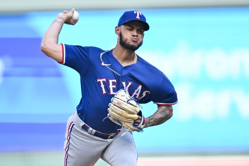 Aug 27, 2023; Minneapolis, Minnesota, USA; Texas Rangers relief pitcher Jonathan Hernandez (72) throws a pitch against the Minnesota Twins during the thirteenth inning at Target Field. Mandatory Credit: Jeffrey Becker-USA TODAY Sports