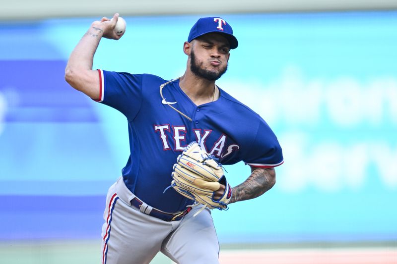 Aug 27, 2023; Minneapolis, Minnesota, USA; Texas Rangers relief pitcher Jonathan Hernandez (72) throws a pitch against the Minnesota Twins during the thirteenth inning at Target Field. Mandatory Credit: Jeffrey Becker-USA TODAY Sports