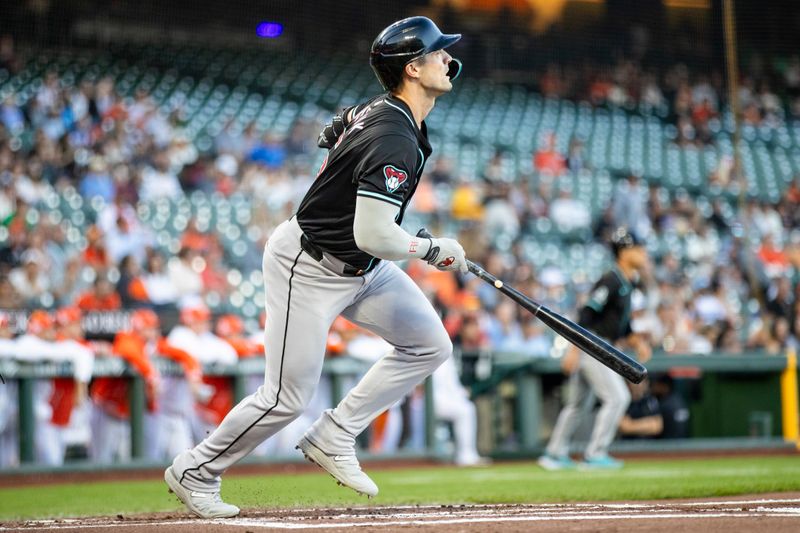 Sep 3, 2024; San Francisco, California, USA;  Arizona Diamondbacks left fielder Randal Grichuk (15) hits a two-run home run against the San Francisco Giants during the first inning at Oracle Park. Mandatory Credit: John Hefti-Imagn Images